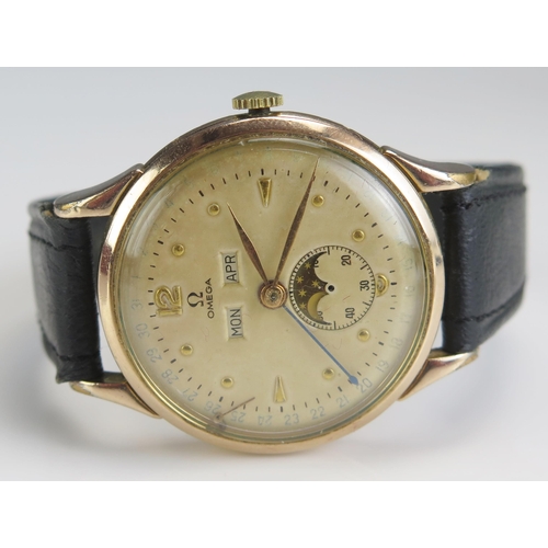 464 - An OMEGA Gold Plated Jumbo Moonphase Triple Calendar Watch, 37.3mm case with Bombay lugs, case back ... 