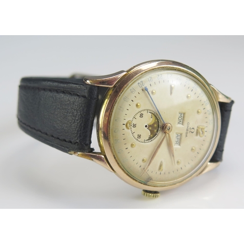 464 - An OMEGA Gold Plated Jumbo Moonphase Triple Calendar Watch, 37.3mm case with Bombay lugs, case back ... 