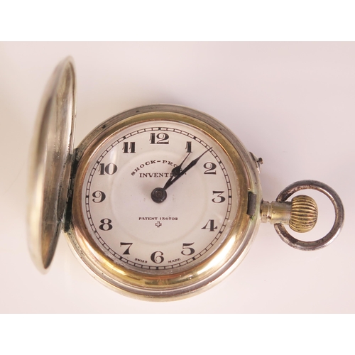 471 - An INVENTIC Shock Proof Half Hunter Pocket Watch in a white metal case