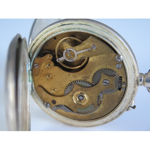 471 - An INVENTIC Shock Proof Half Hunter Pocket Watch in a white metal case