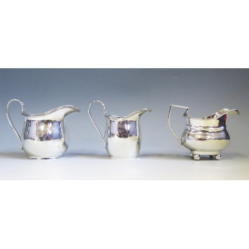 502 - A George VI silver cream jug, maker William Bruford & Son Ltd, London, 1939, of barge-shaped  outlin... 