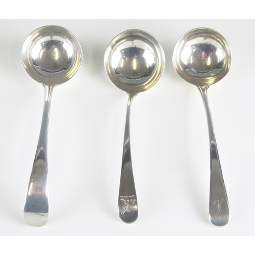 508 - Three assorted silver Old English pattern sauce ladles, various makers and dates, crested or initial... 