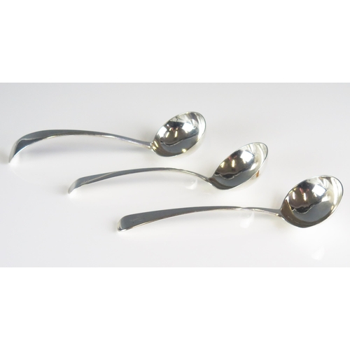 508 - Three assorted silver Old English pattern sauce ladles, various makers and dates, crested or initial... 