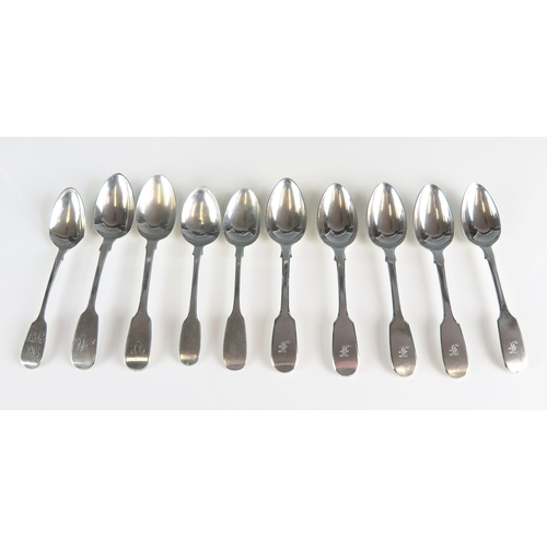 512 - A collection of nine assorted silver fiddle patter teaspoons, various makers and dates, some initial... 