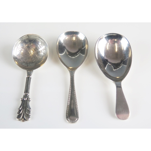 517 - A George IV silver caddy spoon, maker George Unite, Birmingham, 1836, together with two modern  cadd... 