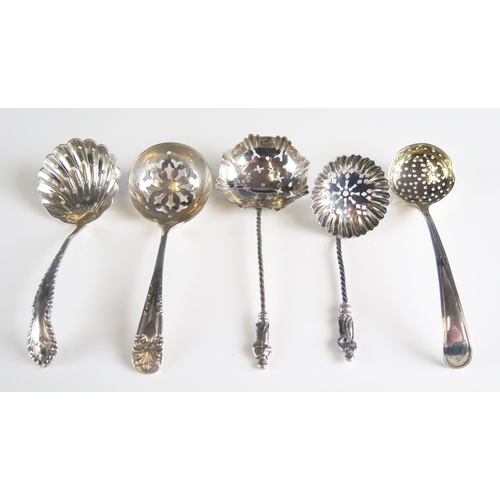 518 - Five assorted silver sifting spoons, various makers and dates, total weight of silver 72gms, 2.34ozs