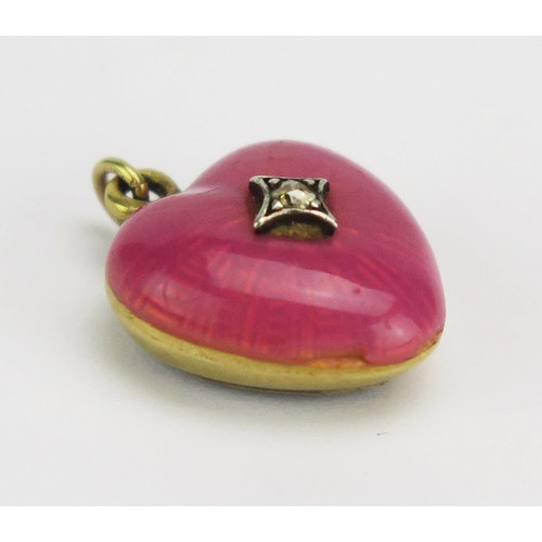 52 - An Antique Precious Yellow Metal and Pink Guilloché Enamel Locket Back Pendant set with an old cut d... 