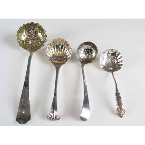 520 - Four assorted silver sifting spoons, various makers and dates, total weight of silver 107gms, 3.45oz... 