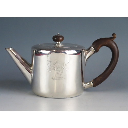 535 - A George III silver teapot, maker Sebastian & James Crespell, London, 1770, crested of plain cylindr... 