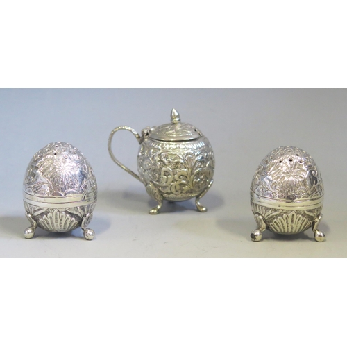 544 - Three Indo-Persian silver condiments, with moulded floral decoration, gross weight, 125gms, 4.02ozs