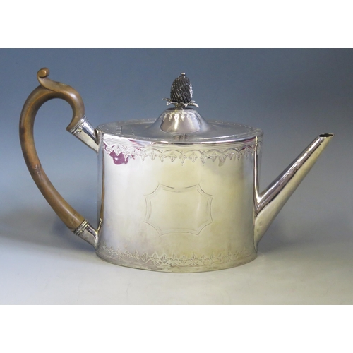 548 - A George III silver teapot, maker W.S possibly William Sumner I, London,1791, of oval outline with b... 