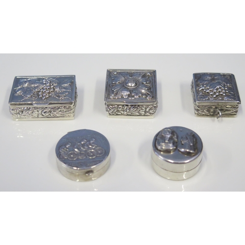 552 - A collection of five continental silver pill boxes various shapes and sizes, total weight of silver ... 