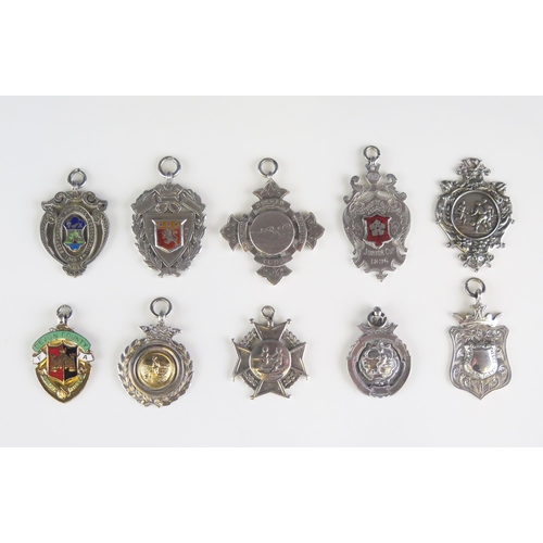 554 - A collection of silver fobs and sporting medallions, various makers and dates, total weight of silve... 