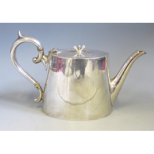 598 - A George V silver bachelors teapot, maker James Deacon & Sons Sheffield, 1925, of oval form, 21cm lo... 