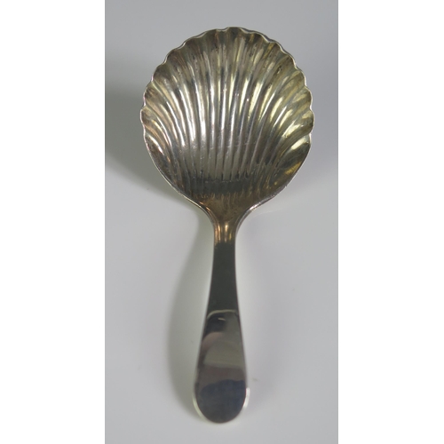 627 - A George III silver Old English pattern caddy spoon, maker JH, London, 1783, with shell-shaped bowl,... 