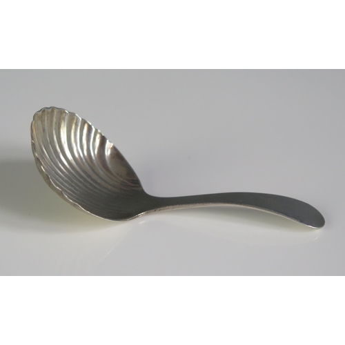 627 - A George III silver Old English pattern caddy spoon, maker JH, London, 1783, with shell-shaped bowl,... 