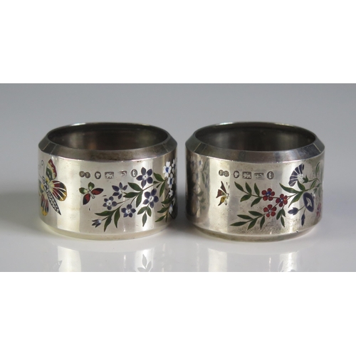 644 - A pair of Victorian silver and champlevé enamel napkin rings, maker Elkington & Co, Birmingham,  188... 