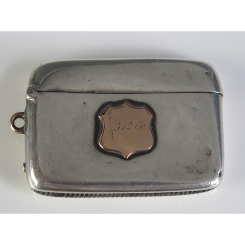 649 - A Victorian silver and gold mounted vesta case, maker Henry Matthews, Birmingham, 1876, 26gms, 0.86o... 