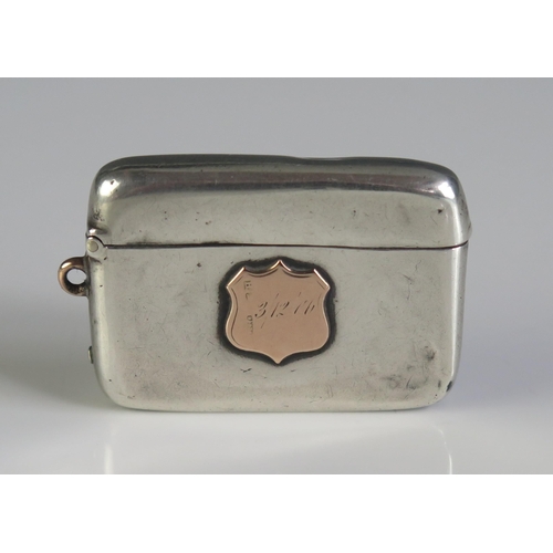 649 - A Victorian silver and gold mounted vesta case, maker Henry Matthews, Birmingham, 1876, 26gms, 0.86o... 