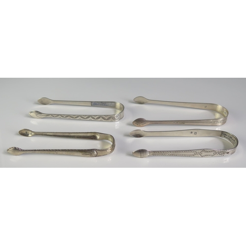 658 - Four Georgian and later silver sugar tongs, various makers and dates, two initialled, total weight o... 