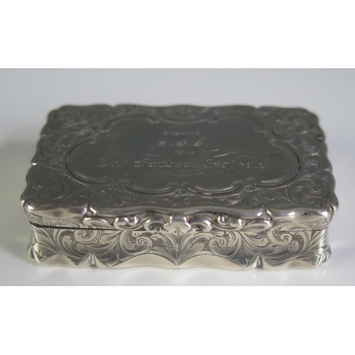 660 - A Victorian silver snuff box, maker Edward Smith, Birmingham, 1860, inscribed, of rectangular outlin... 