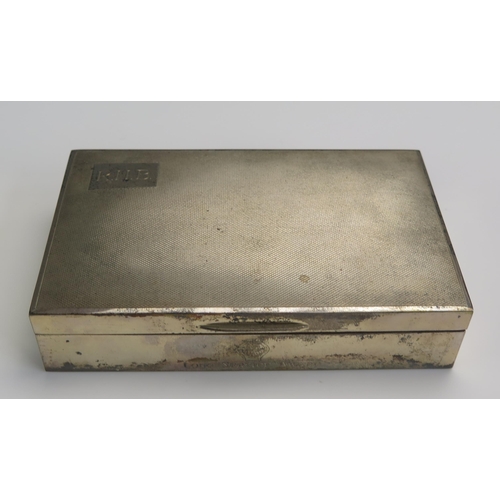 664 - An Elizabeth II silver cigarette box, maker Poston Products Ltd, Birmingham, 1956, initialled, of re... 