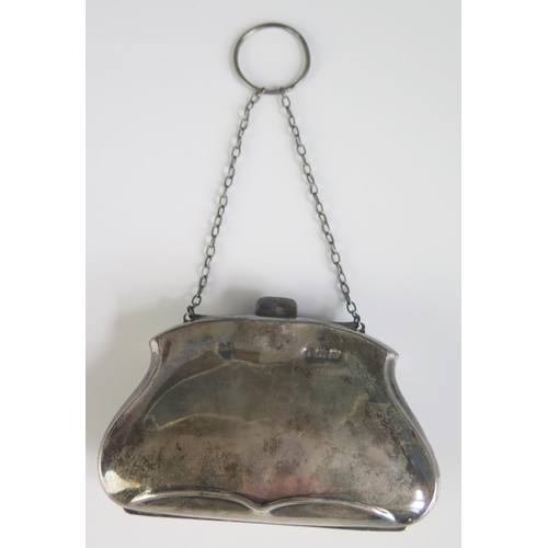 671 - A George V silver purse, maker A J Bailey, Birmingham, 1919, with Morocco leather interior, 9.5cm wi... 