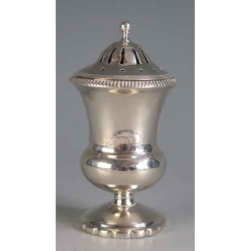 678 - A George IV silver pounce pot, all marks worn, London, 1826, of urn-shaped outline with domed and pi... 