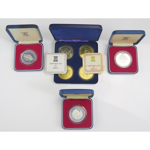 726 - Three 1977 Queen Elizabeth Silver Jubilee Coins and a set of four cupro nickel coins