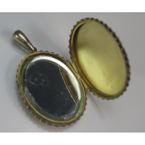 76 - A Victorian Silver and Precious Yellow Metal Locket  with foliate decoration and applied butterfly a... 