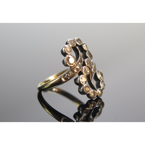 77 - An Antique Old Cut Diamond Ring in a precious yellow and white metal setting, 19.65mm long head, siz... 