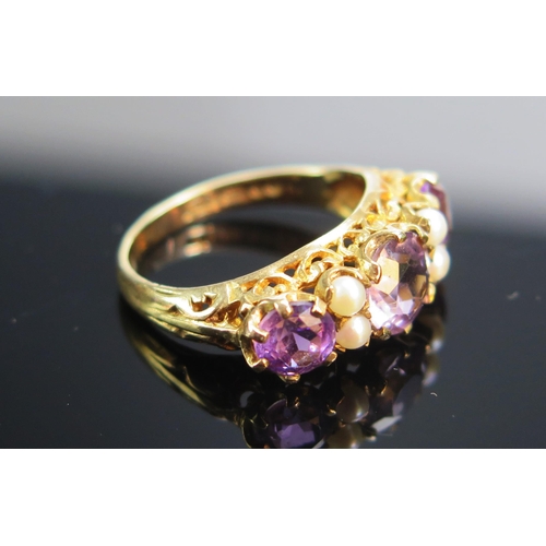 85 - A 9ct Gold, Amethyst and Cultured Pearl Ring, size L.25, hallmarked, 3.05g