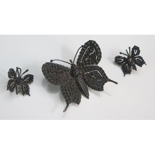 95 - A Cut Steel Butterfly Brooch (43.3mm wingspan) and matching earrings