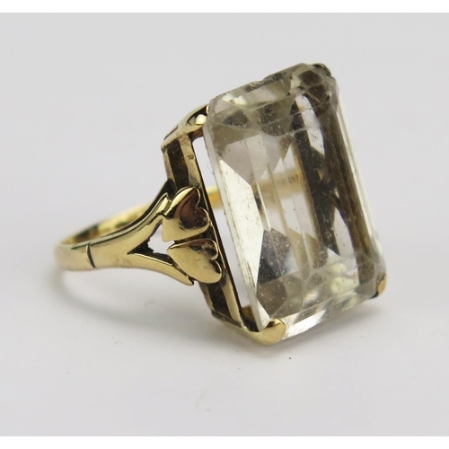 19 - A 9ct Gold and White Topaz Dress Ring, 19.5x14.7mm stone, size M, stamped 9CT, 8.45g. Stone A/F