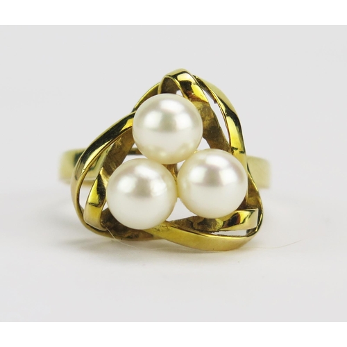 20 - A 14K Cultured Pearl Ring in a triangular entwined setting, 14.8mm head, size O, stamped `4K 585, 3.... 