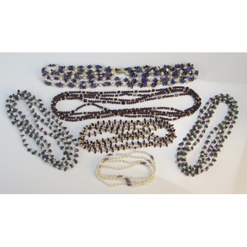 203 - Two Garnet and Cultured Pearl Necklaces, a garnet lapis and amethyst necklace, amethyst and fresh wa... 