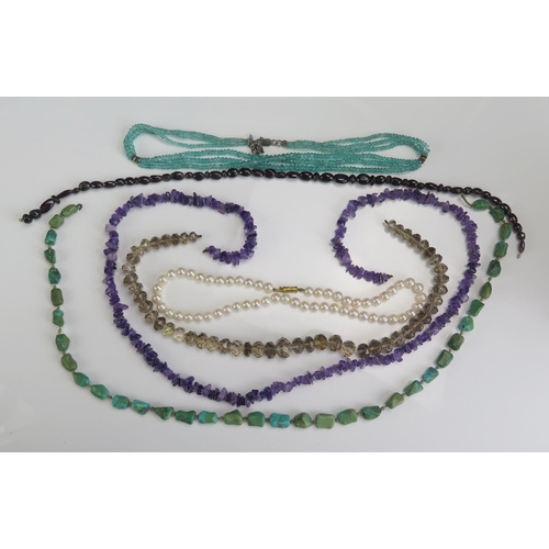 205 - A Selection of Necklaces including smoky quartz, garnet, amethyst, turquoise, seed pearl, etc.