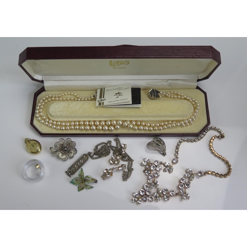 206 - An Egyptian Silver Hieroglyphic Pendant, costume jewellery, boxed set of Lotus simulated pearls with... 