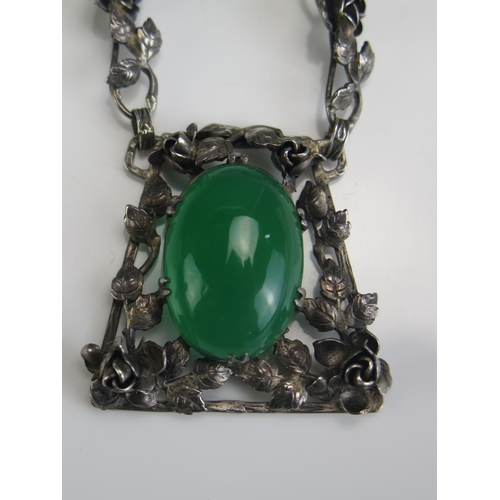 214 - A Silver and Green Paste Necklace