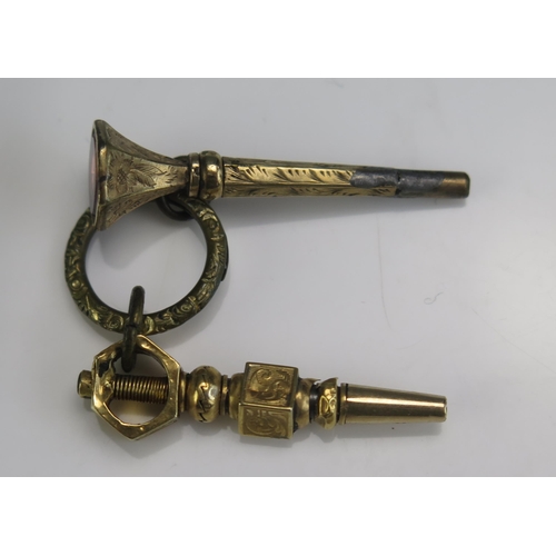 236 - A 19th Century Precious Yellow Metal Pocket watch Key and one other with a jump ring