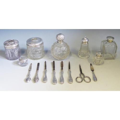 570 - A collection of clear glass and silver mounted dressing table jars, together with assorted silver ha... 