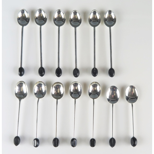 579 - Thirteen assorted silver 'Bean' topped coffee spoons, various makers and dates, gross weight 87gms, ... 