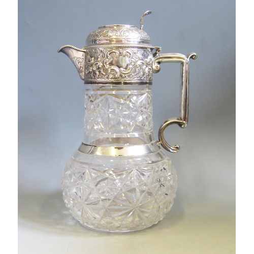 593 - An Edward VII clear glass and silver mounted claret jug, maker Goldsmiths & Silversmiths Co Ltd, Lon... 