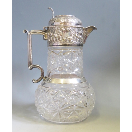 593 - An Edward VII clear glass and silver mounted claret jug, maker Goldsmiths & Silversmiths Co Ltd, Lon... 