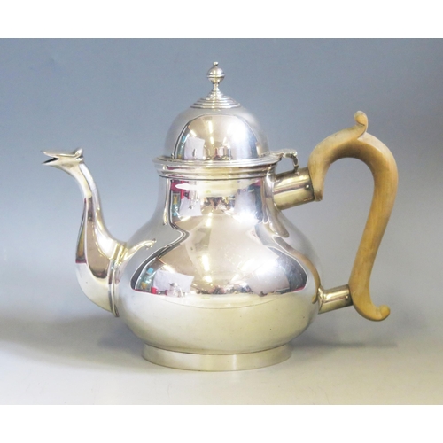 596 - An Edward VII silver teapot, maker C S Harris & Sons Ltd, London, 1909, of squat globular form with ... 