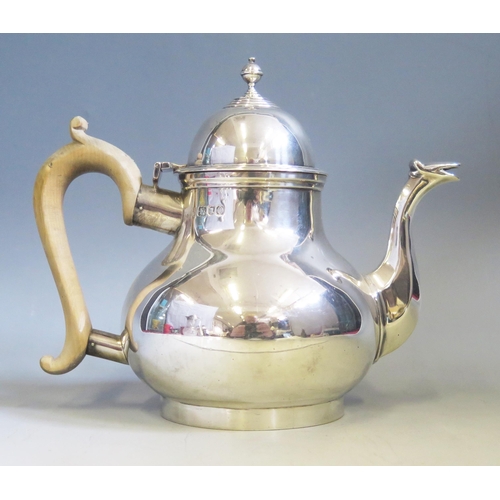 596 - An Edward VII silver teapot, maker C S Harris & Sons Ltd, London, 1909, of squat globular form with ... 