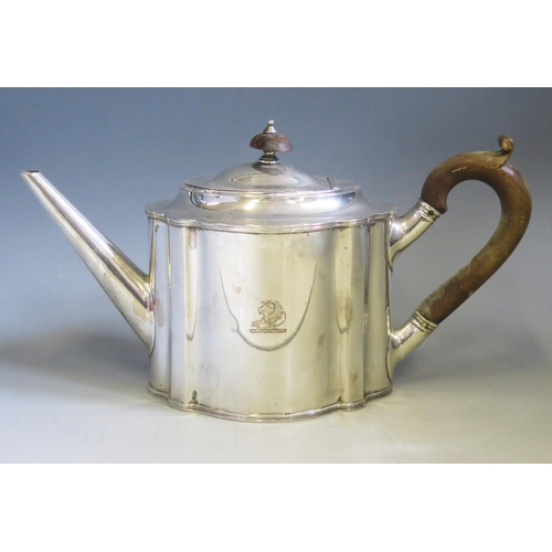 597 - A George V silver teapot, maker Horace Woodward & Co, London, 1912, crested, of oval outline, 28cm l... 