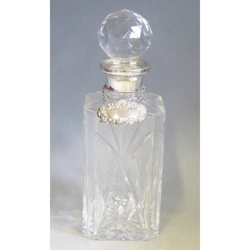 603 - An Elizabeth II clear glass and silver mounted decanter and stopper, maker Harrods Ltd, London,  198... 