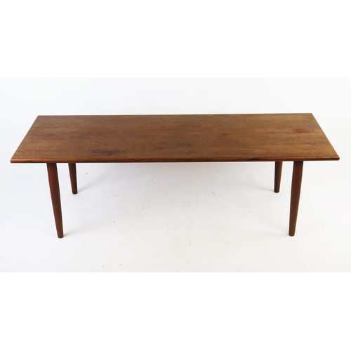 1626A - A teak effect occasional table, the rectangular top raised on turned legs, 135cm long, 51cm deep, 42... 