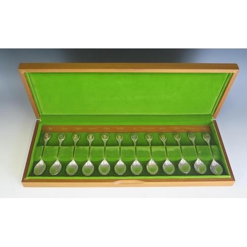 594 - A set of twelve Elizabeth II Royal Horticultural Society silver flower spoons, maker John Pinches, S... 